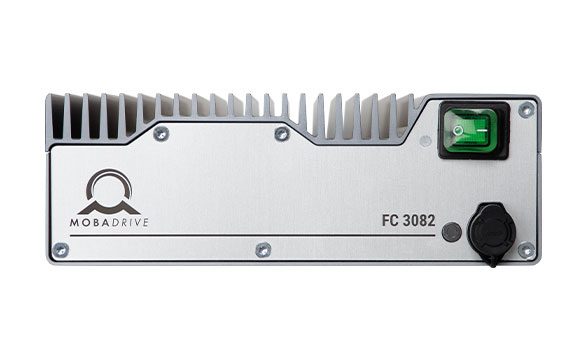Front view of the MOBADRIVE FC 3082, showing the branded faceplate, top heat sink, green power switch, status indicator and front connector.